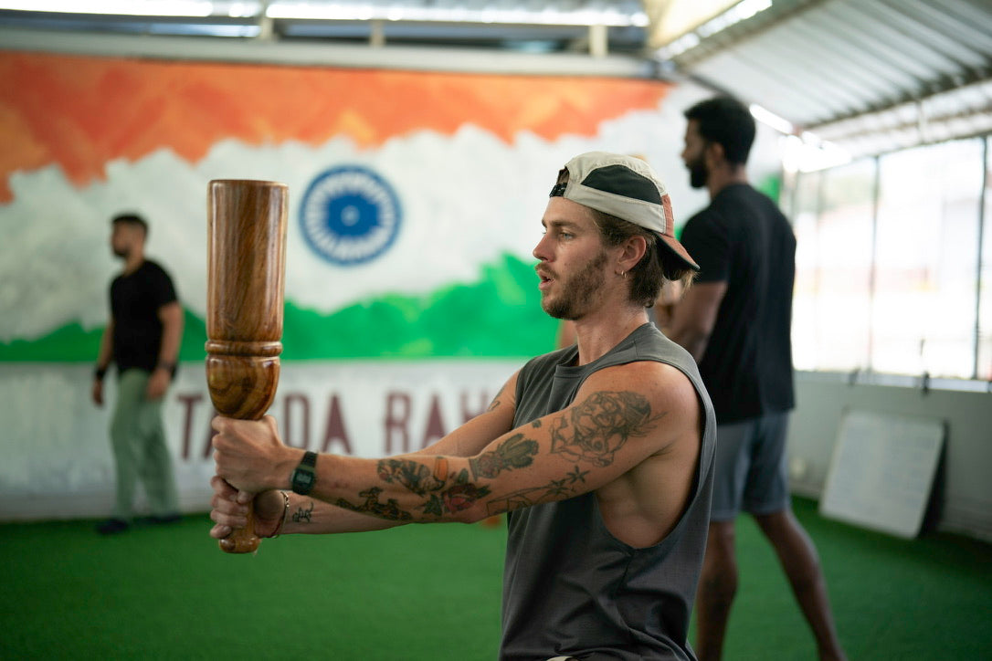 Traveller_using_tagda_raho_indian_adjustable_wooden_club